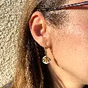 Boucle d'oreille Aube portée.webp